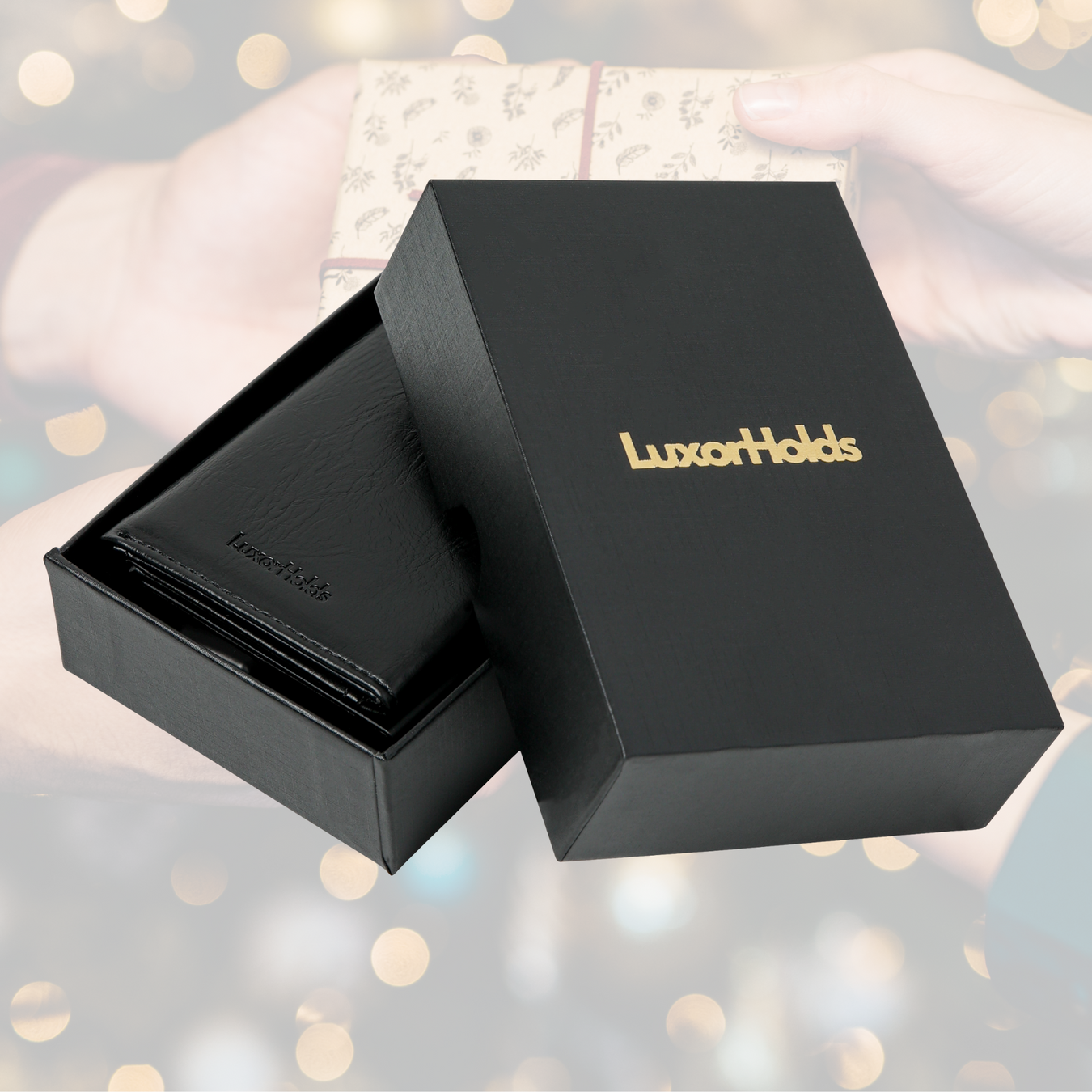 zwarte pasjeshouder in geschenkdoos